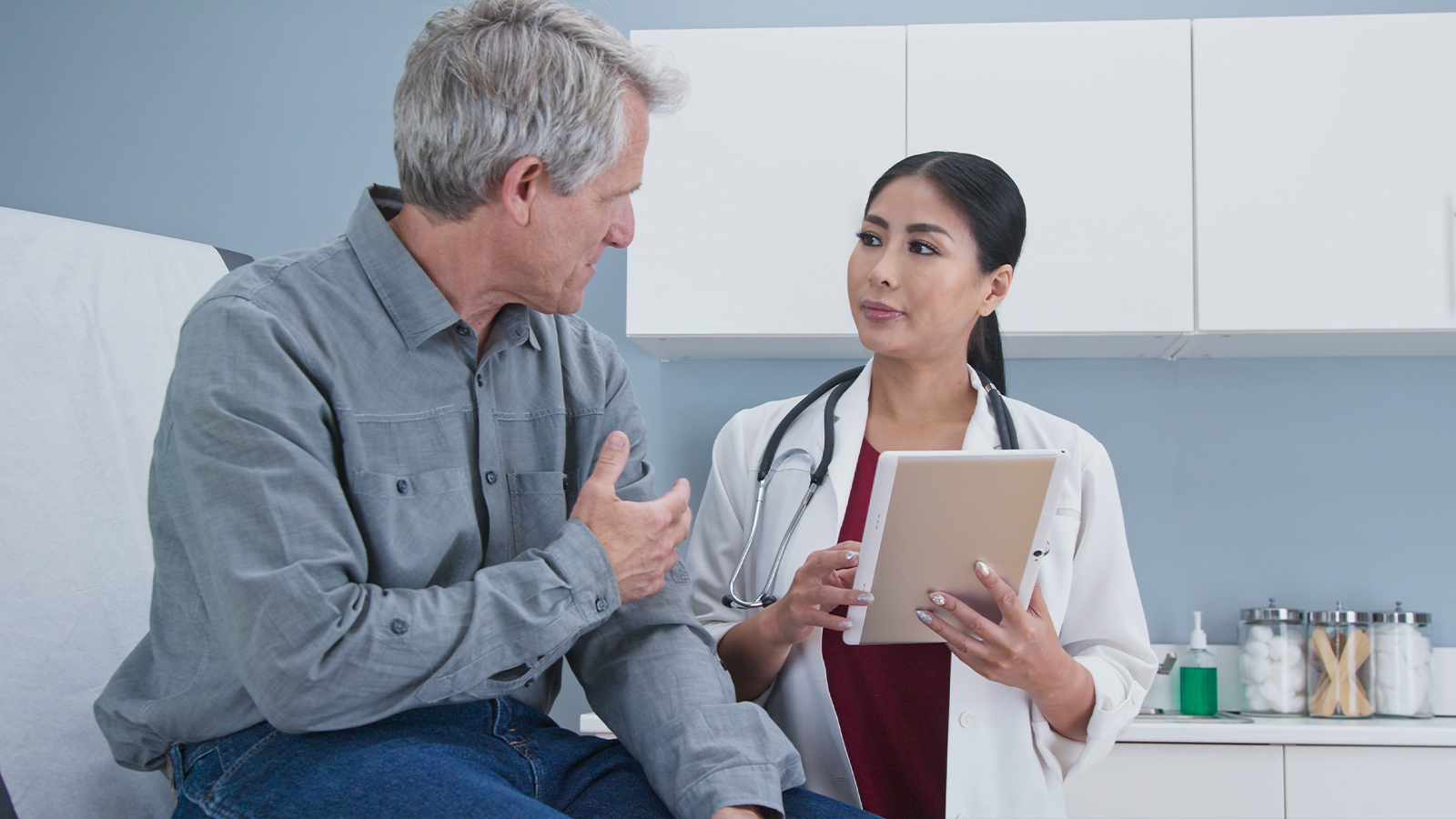 Family Medicine Doctor Talking To Patient
